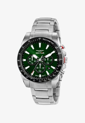 Silberne Edelstahl-Uhr mit grünem Zifferblatt, drei Subzifferblättern, Tachymeter und auffälligen Stundenmarkierungen. Hat rote Akzente auf der Krone.