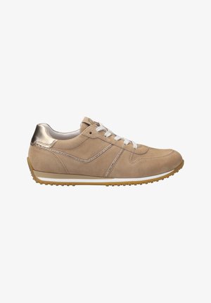 Tan suede sneaker with a metallic heel accent, white laces, and a textured rubber sole. Features subtle stitching and sporty design lines.