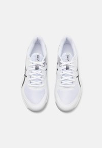 White athletic shoes with mesh panels, textured toe box, black accents, and flat white laces. The sole is designed for traction and support.