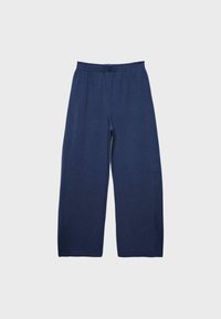 Granatowe, szerokie spodnie z miękkiego materiału, wyposażone w elastyczną talię dla komfortu, o gładkim wzorze bez nadruków czy dodatków.