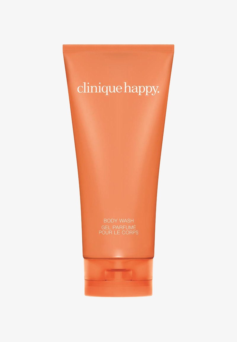 Oransje, klembar tube med Clinique Happy kroppsvask med hvit tekst, med avrundet bunn og med flip-top lokk.