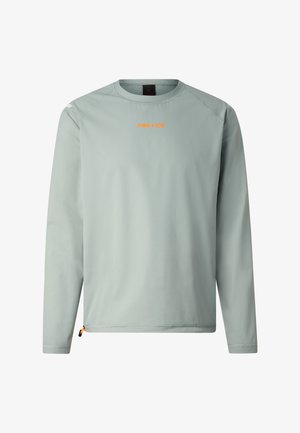 T-shirt gris clair à manches longues avec col rond, texte orange « FIRE + ICE » centré sur la poitrine et détail zip en bas à gauche.