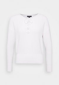 Maglione bianco lavorato a maglia con scollatura tonda, chiusura a lacci sul fronte e polsini e orlo a costine. Tessuto leggero e vestibilità casual.