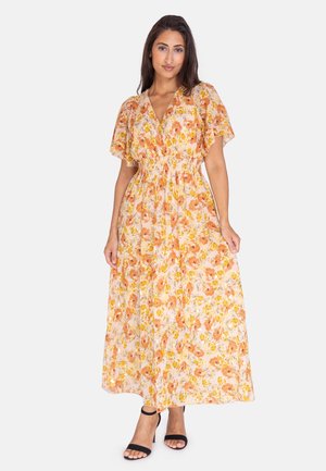 Vestido maxi de tela ligera y transparente con un estampado floral en naranja y amarillo. Incluye mangas cortas y una cintura elástica.