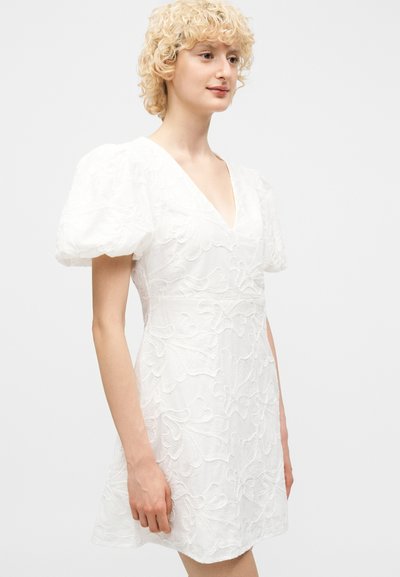 green emerald velvet dress Eyelet Bustier Flounce Mini Dress in White main image 0