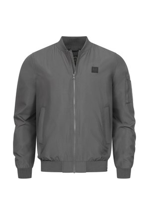 Blouson bomber gris avec fermeture éclair sur le devant, poignets et ourlet côtelés, poches latérales, et poche zippée sur la manche gauche. Fini en tissu lisse.