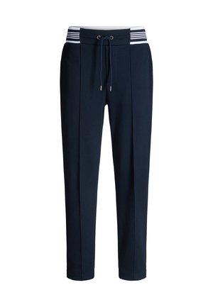 Marineblaue Jogginghosen mit weiß gestreiftem Bund, Kordelzugverschluss und zwei vorderen Falten, hergestellt aus weichem Baumwollmischgewebe.
