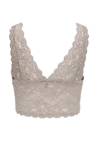 Μπεζ μπραλέτα από δαντέλα με ανθικά σχέδια, φαρδιές δαντελένιες τιράντες και κυματιστά τελειώματα, εμφανίζεται από μπροστά σε λευκό φόντο.