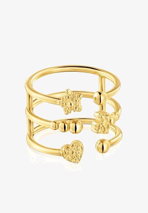 Anello in tonalità oro con più bande arricchite da dettagli testurizzati tra cui un cuore, una stella e perline arrotondate; finitura liscia e lucida.