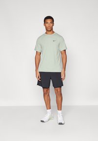 Nike Performance HYVERSE - Športové tričko - jade horizon/black