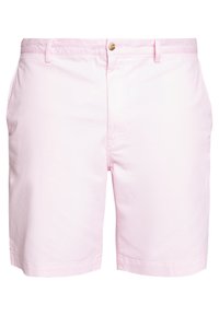 Světlé růžové šortky s klasickým designem, vyrobené z bavlny. Mají zapínání na knoflík a dvě boční kapsy. Hladká textura, délka ke kolenům.