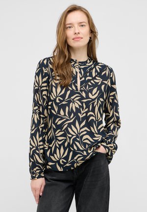 Langärmlige Bluse in Marineblau mit einem beigen Blattmuster. Verfügt über einen Schlüssellochausschnitt und elastische Bündchen. Hergestellt aus einem leichten, glatten Stoff.