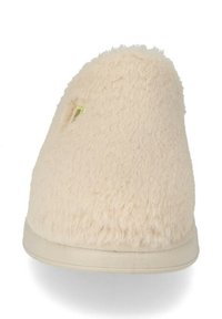 Pantofole di peluche crema con punta arrotondata, upper morbido e testurizzato, suola in gomma e un piccolo dettaglio ricamato sulla parte anteriore.