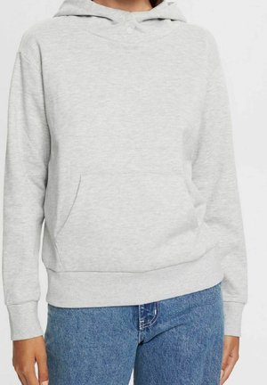 Grijze hoodie met een voorzak, ribbelmanchetten en een zoom. Gemaakt van zachte stof met een gladde textuur. Het ontwerp is eenvoudig en nauwsluitend.
