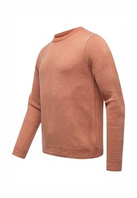 Sweter w kolorze rdzy z teksturowanym splotem, okrągłym dekoltem, długimi rękawami oraz ściągaczami przy mankietach i u dołu.