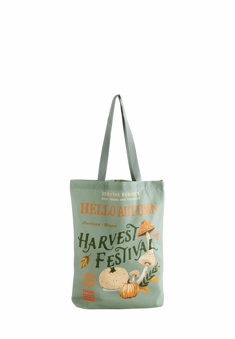Borsa a spalla in tela verde chiaro con grafiche a tema autunnale, tra cui zucche e funghi, con il testo "Ciao Autunno" e "Festa del Raccolto."