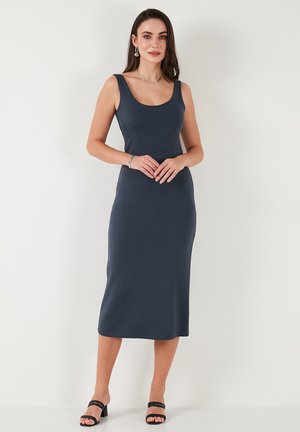 Dark navy sleeveless midi dress made of smooth fabric with a fitted silhouette, featuring a round neckline and simple design.