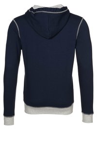 Marinblå hoodie med grå insida, som har dragsko i huvan, långa ärmar och ribbade muddar och nederkant. Slät yta och kontrasterande sömmar.