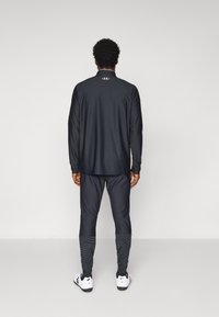 Under Armour PRO PANT - Donji dijelovi trenirke - black/white