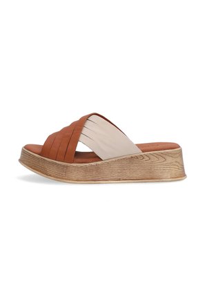 Brown and beige slide sandal with wide straps, textured leather, and a wedge wood-patterned sole. Featuring a cushioned footbed for comfort.