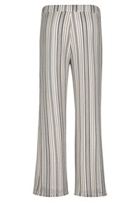 Wijdvallende broeken van een lichtgewicht stof met verticale zwart-witte strepen en een subtiel patroon. Elastische tailleband voor comfort.
