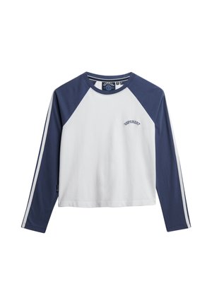 Chemise courte à manches longues avec un corps blanc et des manches raglan bleu marine. Dotée d'un petit logo sur la poitrine et de deux rayures latérales sur les manches.