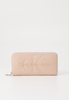 SCULPTED ZIP AROUND MONO - Portafoglio - rose dust