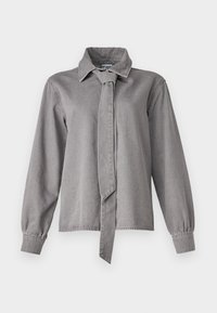 Grå långärmad skjorta i mjuk bomull med krage och detalj av framknutning, med en avslappnad passform och något puffade ärmar.