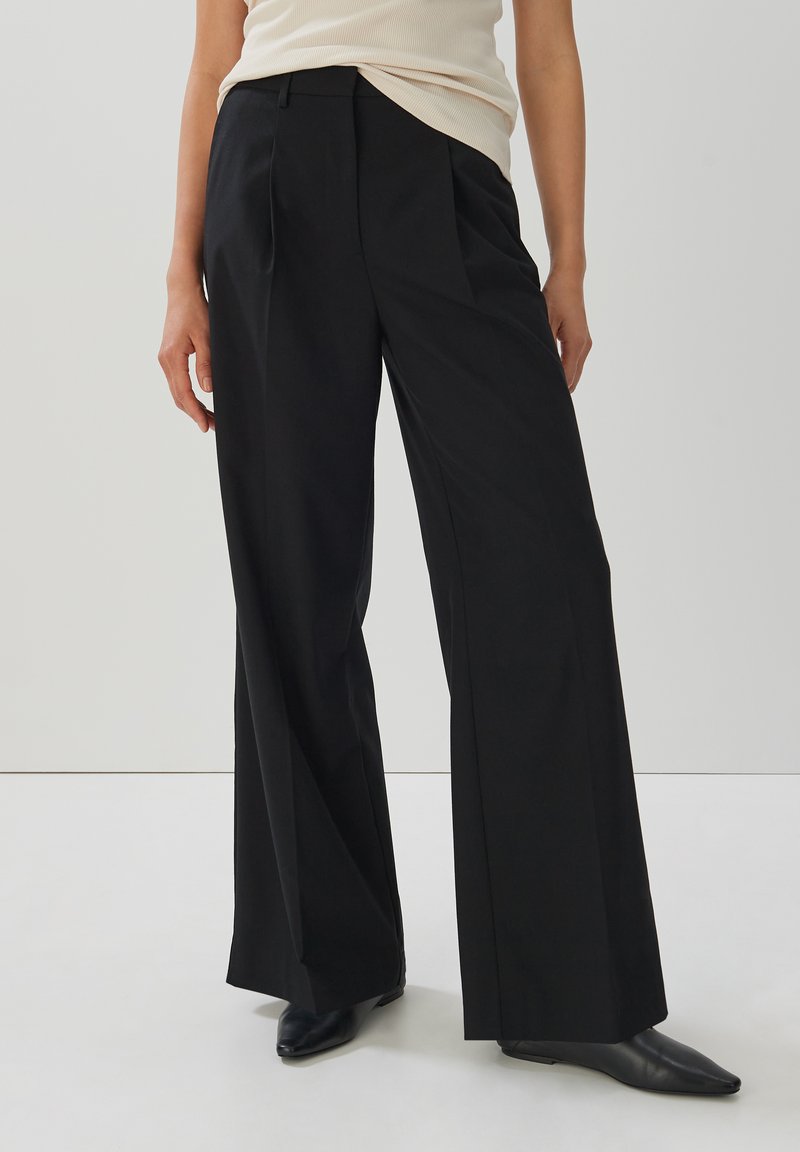 someday. CELONG - Pantalon classique - black