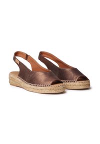 Brun metallisk slingback espadrille med öppet tåparti, sula av jute rep och överdel av slätt läder. Utsmyckad med en utskuren sida.