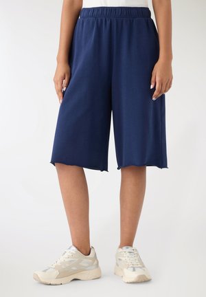 - Spodnie treningowe