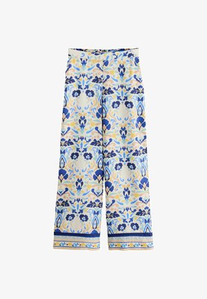 Wide-leg pants with blue, yellow, and beige floral and ornamental patterns, featuring a bordered hem with decorative stripes.