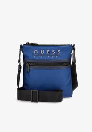 Borsa a tracolla in nylon blu con tracolla nera regolabile. Caratterizzata da un logo argentato e una tasca con zipper sul fronte. Texture liscia, forma rettangolare.