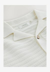 Giacca-camicia a maniche corte Denim di cotone Oblique Kasuri blu Giacca-camicia a maniche corte Denim di cotone Oblique Kasuri blu