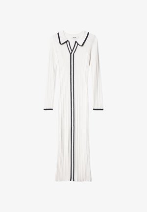 Witte geribbelde midi-jurk met lange mouwen en zwarte afwerking op de kraag, knoopsluiting en manchetten, met een puntkraag en knoopsluiting.