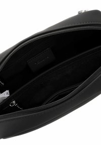 Black leather zippered pouch with a smooth texture, featuring an interior pocket and fabric lining. Hardware includes a silver zipper.