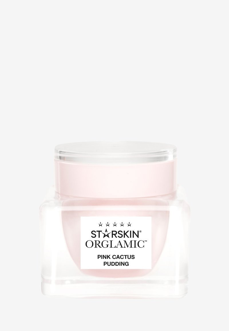 Przezroczysty pojemnik z różową wewnętrzną warstwą. Biała etykieta z czarnym tekstem "STARSKIN ORGANIC PINK CACTUS PUDDING". Gładkie, błyszczące wykończenie.