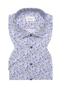 Camicia bianca con un motivo floreale blu e verde, dotata di colletto classico, chiusura a bottoni e design slim fit.