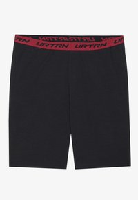 Svarte shorts laget av mykt stoff med ensfarget design, elastisk midjebånd med røde "URTRN" bokstaver, og standard lengde.