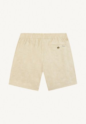 Shorts à taille élastique beige avec une unique poche arrière boutonnée et un tissu subtilement texturé.