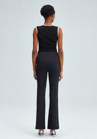 Touché Privé HIGH WAIST STITCHED   - Pantaloni - black
