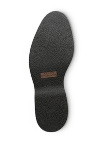 Zwarte, gestructureerde schoeninlegzool met een rechthoekig merkembleem waarop "ALLEN EDMONDS" is geperst. De vorm is ontworpen om zich aan de voet aan te passen.