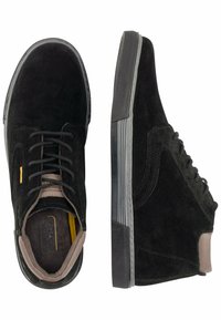 Black suede high-top sneakers featuring a rounded toe, gray rubber sole, and beige accents. Contains laces and a lightly padded ankle.