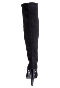Botte noire montante en daim avec une silhouette élancée, un bout pointu et un talon haut brillant, présentant une texture lisse et des coutures simples.