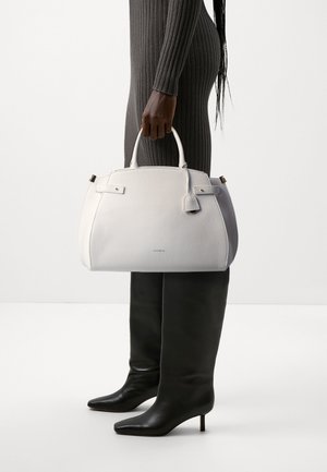 Coccinelle KLICHE - Sac à main - brillant white