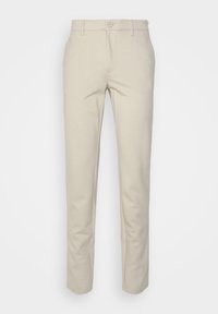 Pantalon beige slim fit avec fermeture à boutons, passants pour ceinture et poches latérales, présenté sur fond blanc.