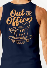 Navy blue tank top featuring orange graphic design of a cat on a skateboard with text "Out of Office" and "Time to have some fun."