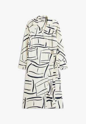 Abito lungo color crema con linee astratte nere a pennellate, maniche lunghe, colletto e cintura abbinata con fibbia dorata.