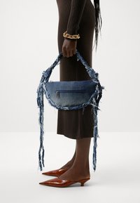 Steve Madden - BOSLO - Across body bag - blue denim Thumbnail Image 1