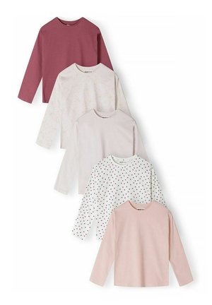 Cinq chemises à manches longues dans des tons de rose et blanc, comprenant des couleurs unies et des motifs avec des nœuds et de petits cœurs.